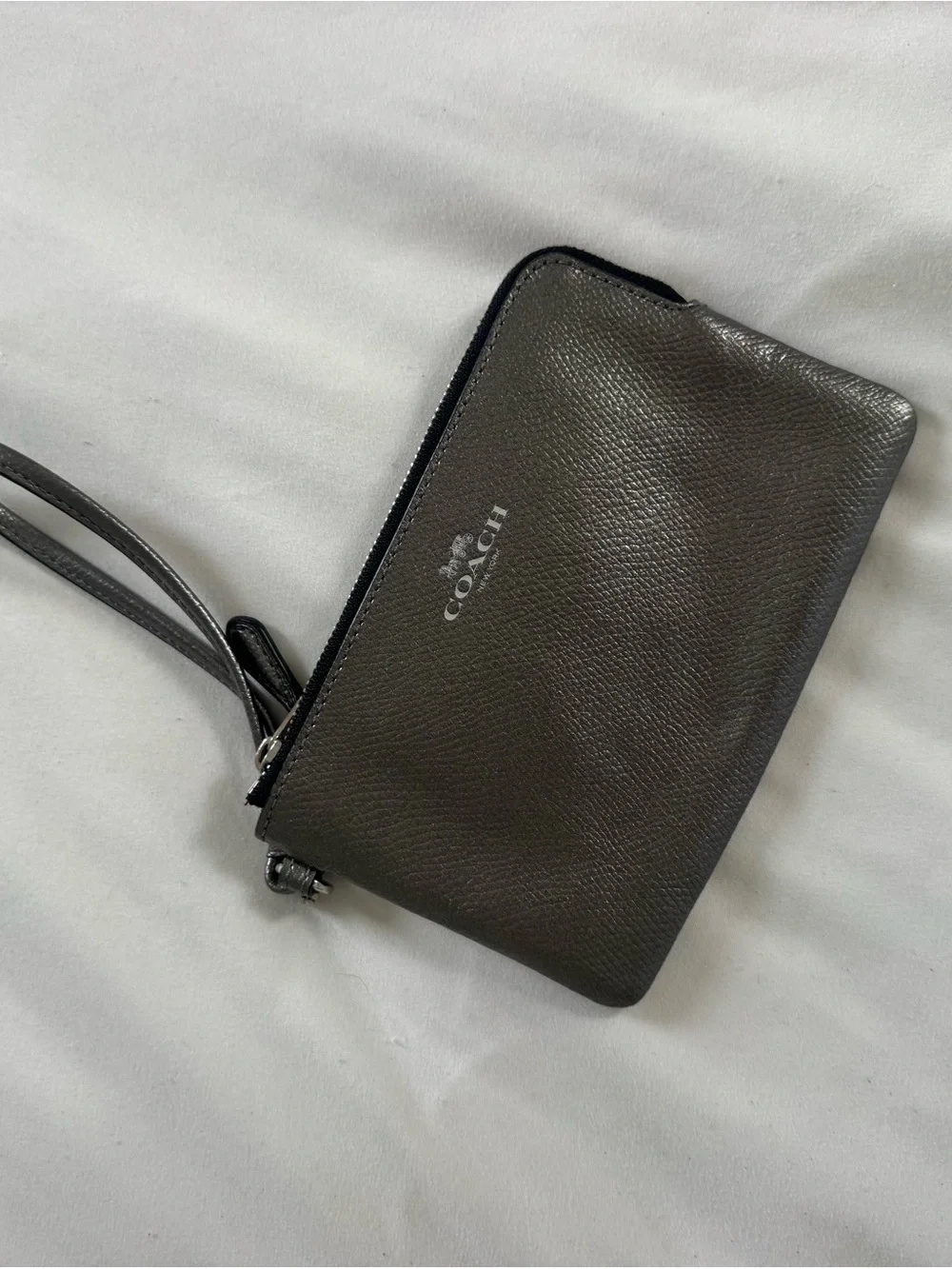 Coach women’s Metallic Grey Pebbled Leather Wristlet